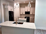 new construction kitchen by MCM Homes, LLC