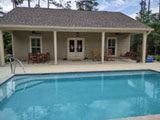 Pool house in Covington Louisiana by MCM Homes